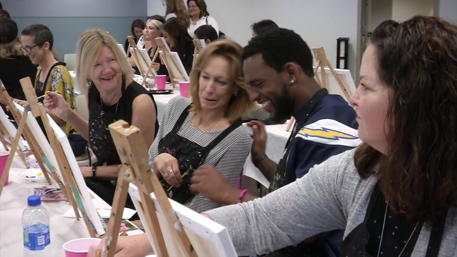 Chargers kick off Breast Cancer Awareness Month by visiting OC patients