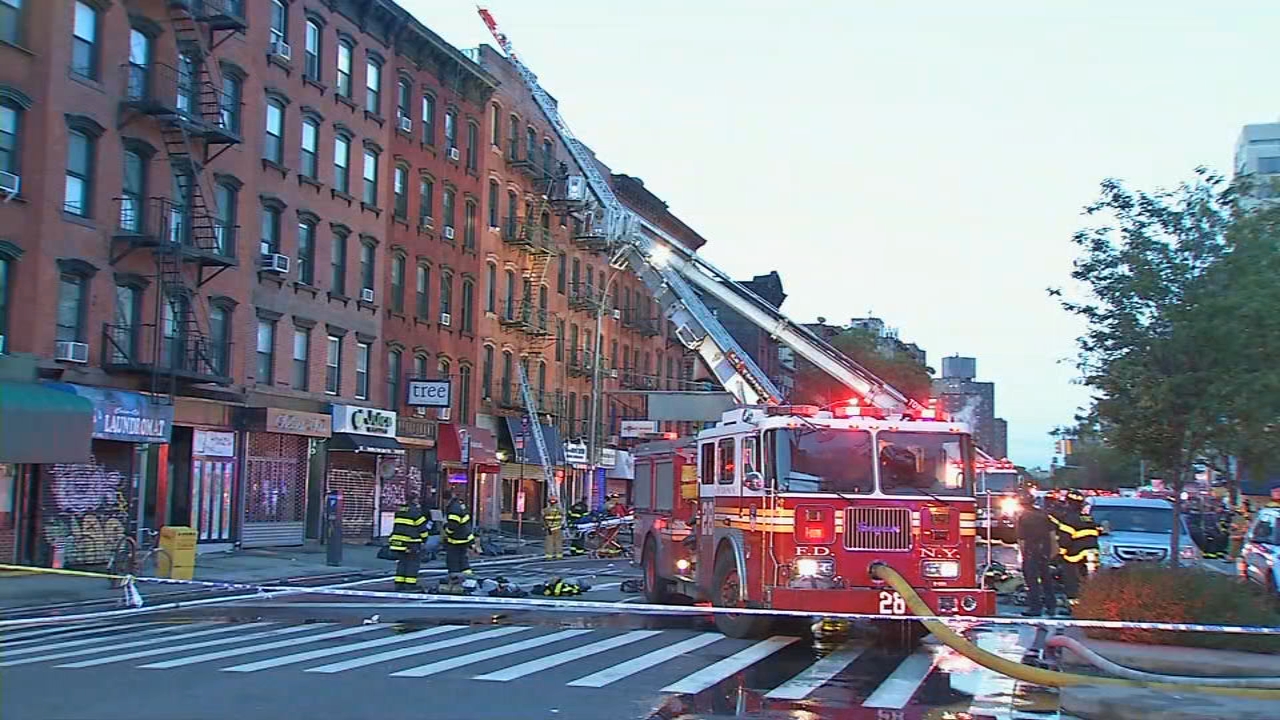 11 firefighters, 3 residents hurt in Manhattan apartment fire