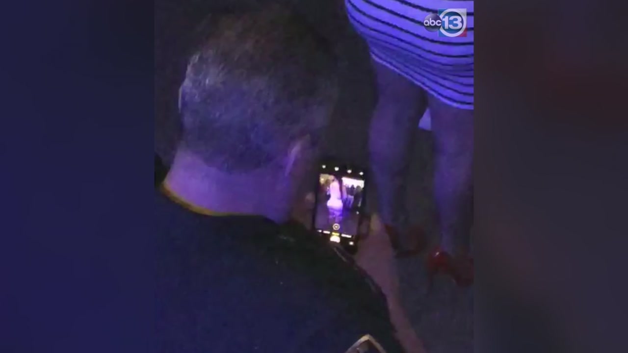 Officer caught filming woman