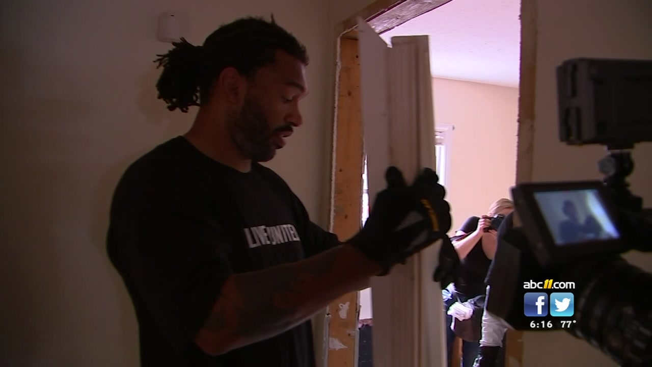 Panthers' defensive lineman Julius Peppers was in Lumberton on Tuesday to help with hurricane Florence relief.