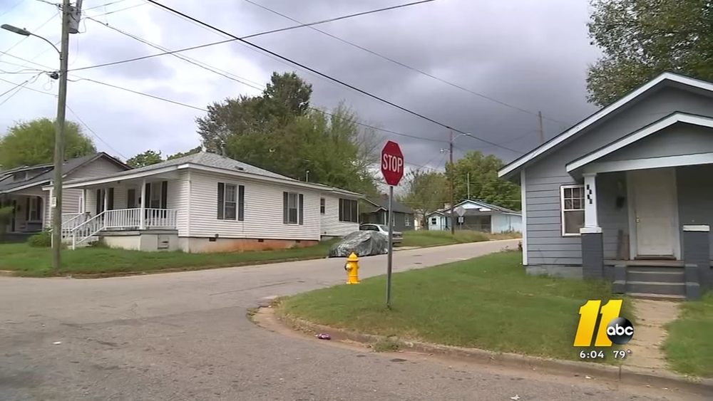 Parents demand change after gunshots at bus stop.