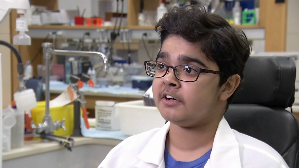 Teen helping researchers try to find a cure for the disease that he lives with