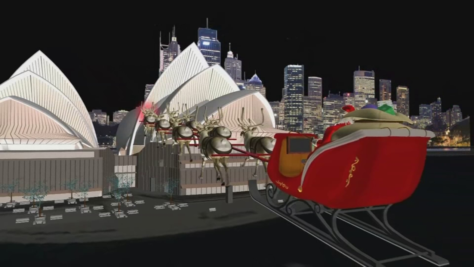 Santa flies by the Sydney Opera House in Australia ABC13 Houston