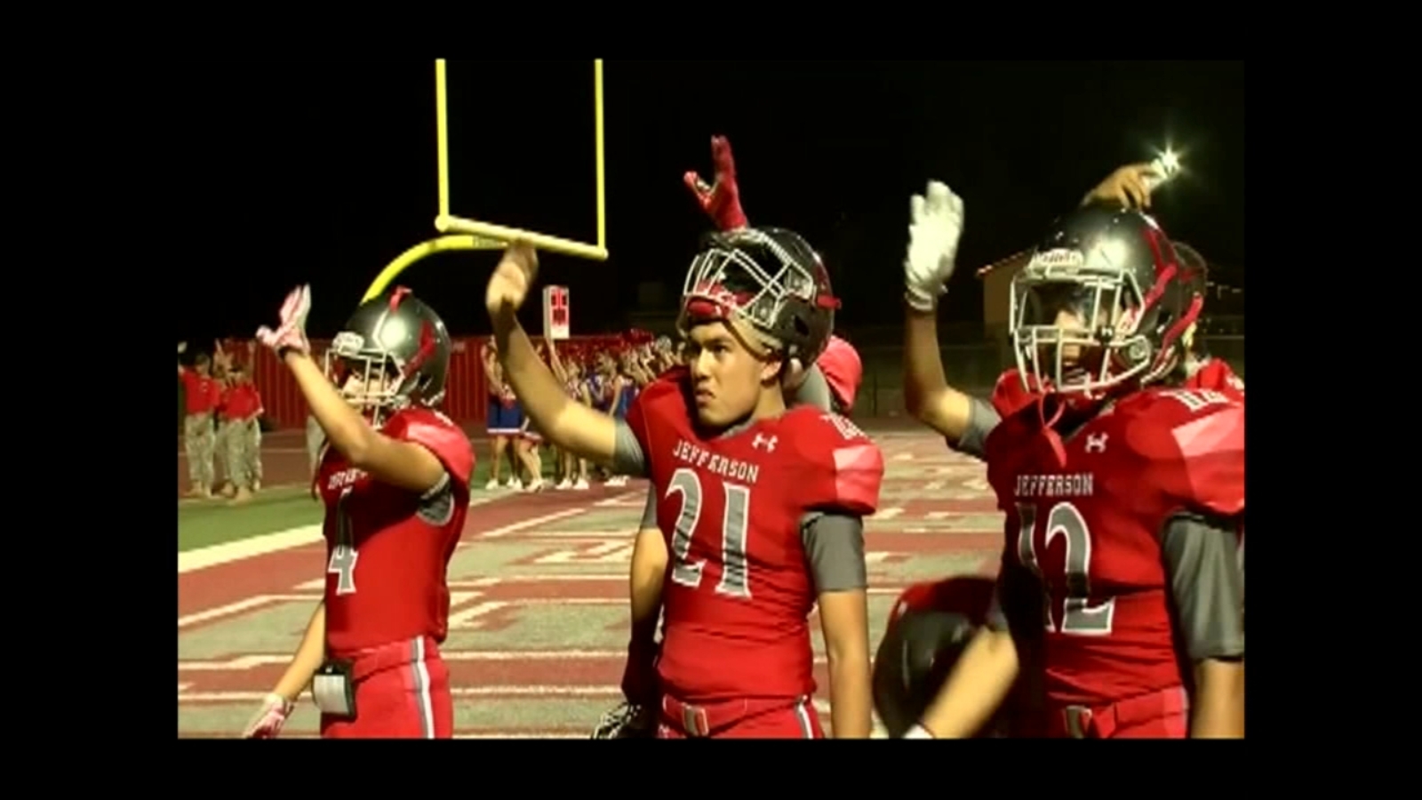 Jefferson High School football team waves to children's hospital