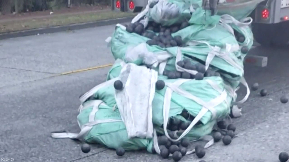 44,000 pounds of metal balls spill, bounce down Seattle street