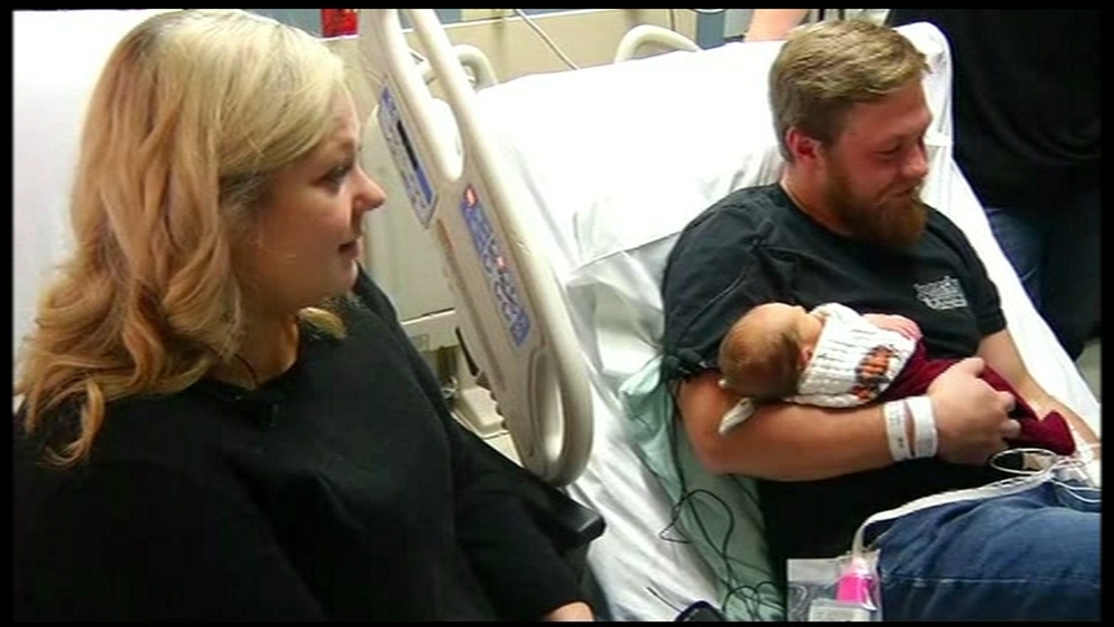 Woman saves husband's life and gives birth in same week