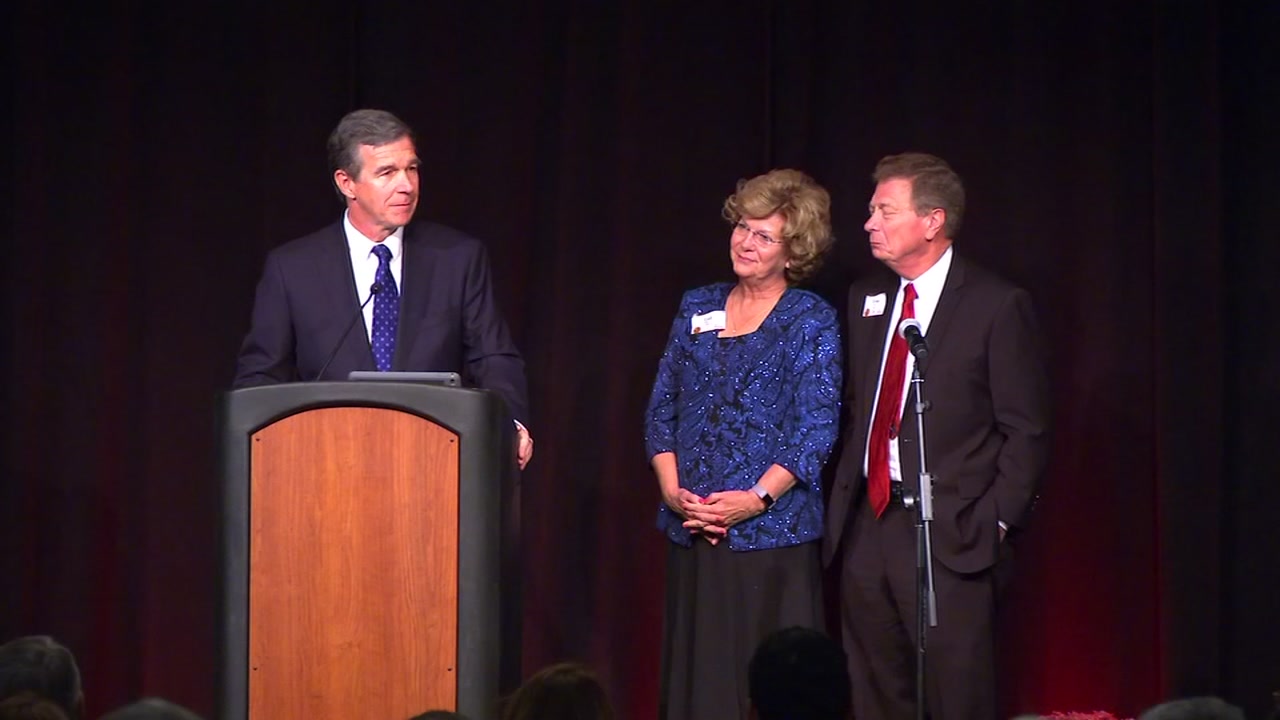 Gov. Cooper gives state's highest honor to Durham Rescue Mission founders