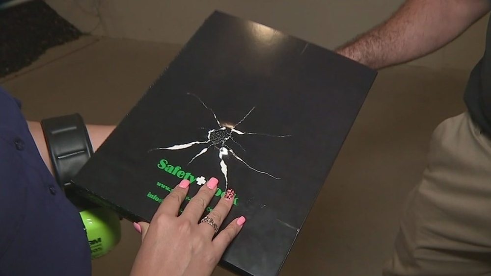 Dad invents bulletproof book as shield in shootings