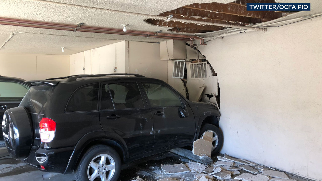 4 hurt after car crashes into water heater, causes gas explosion in OC