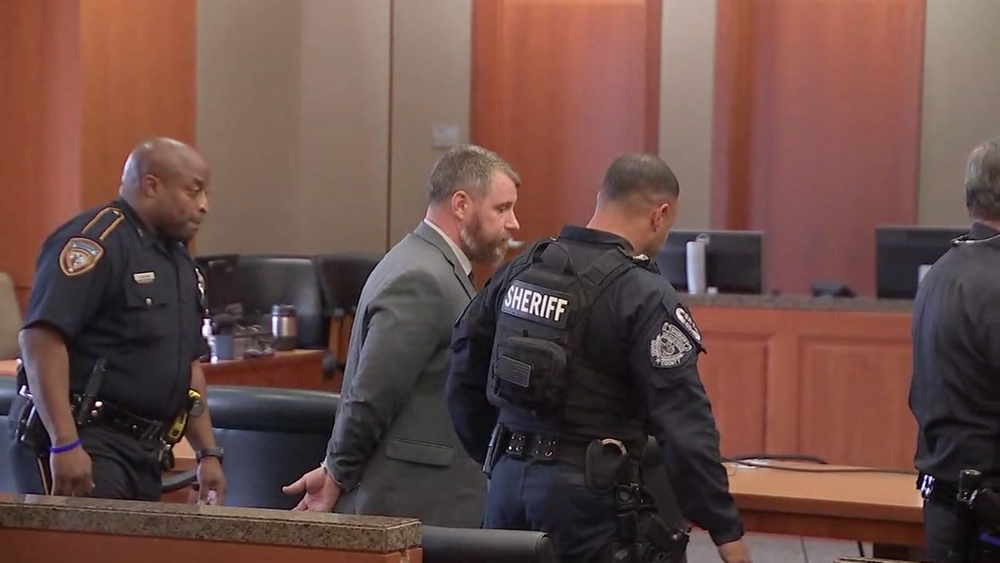 Terry Thompson handcuffed after guilty verdict