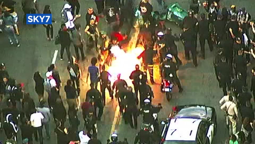 aEXCLUSIVE: Oakland police have arrested a man they say injured six officers with improvised explosive devices during huge march to protest the fatal stabbing of Nia Wilson at a BART station.
