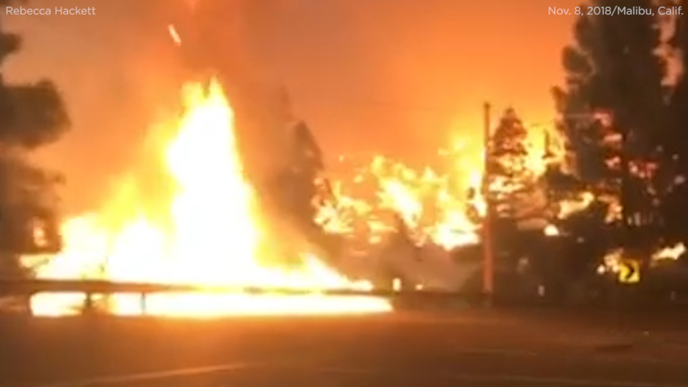 VIDEO: Woman drives through flames to flee Malibu wildfire
