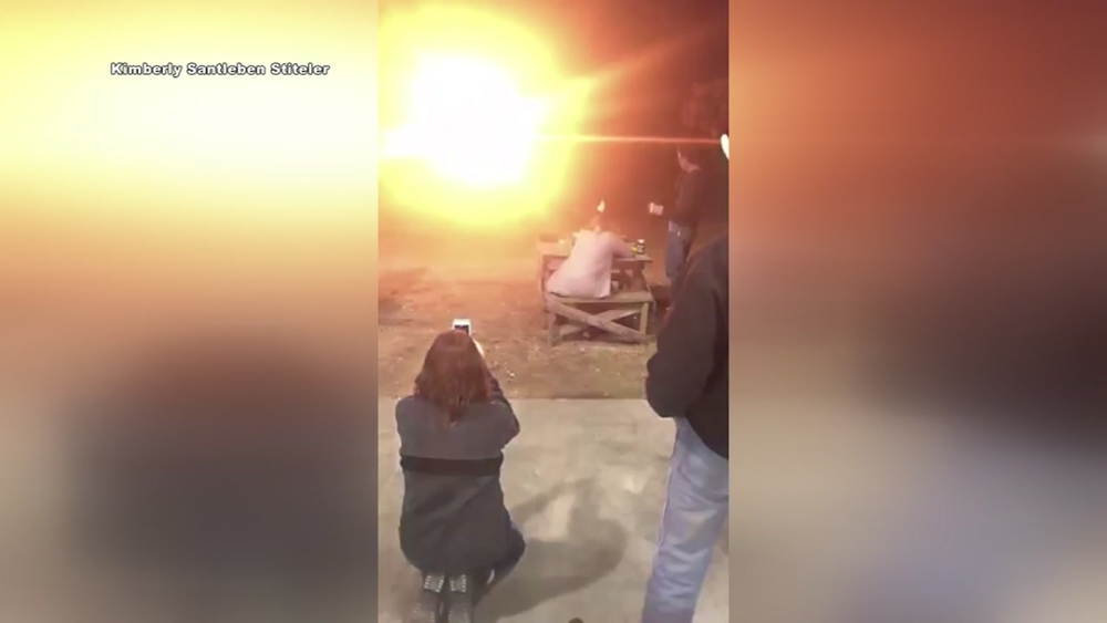 Woman blows up wedding dress
