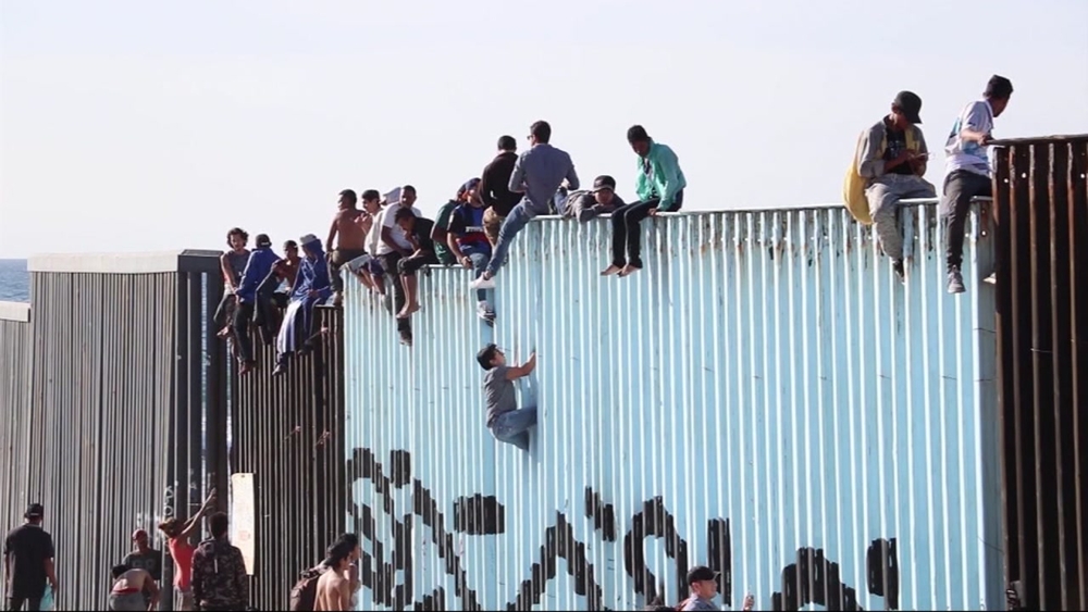 Central American migrants seeking asylum reach US-Mexico border in Tijuana