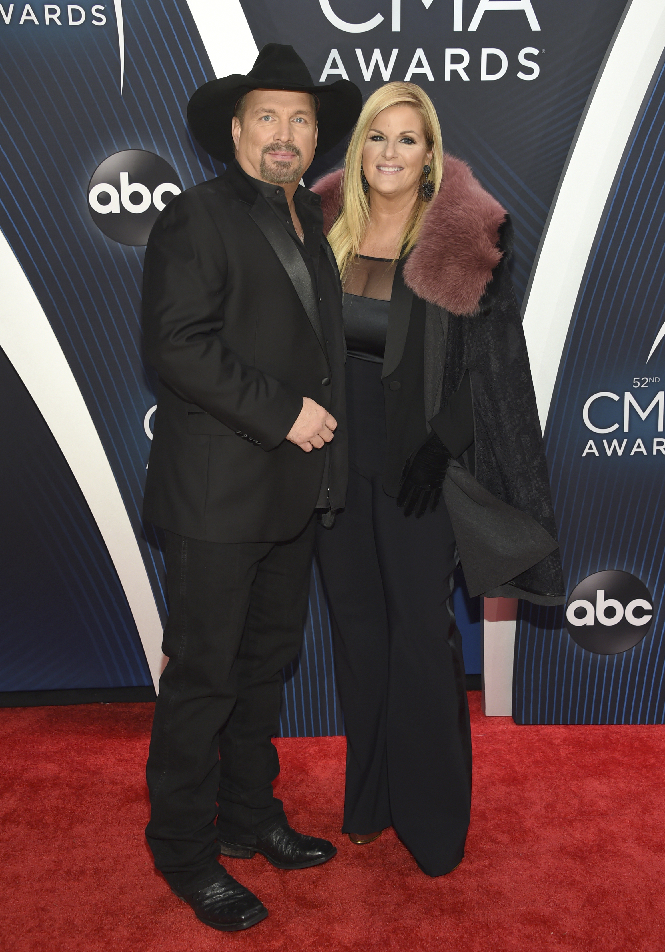 Garth Brooks, left, and Trisha Yearwood arrive at the 52nd annual CMA Awards at Bridgestone Arena on Wednesday, Nov. 14, 2018, in Nashville. (Photo by Evan Agostini/Invision/AP)