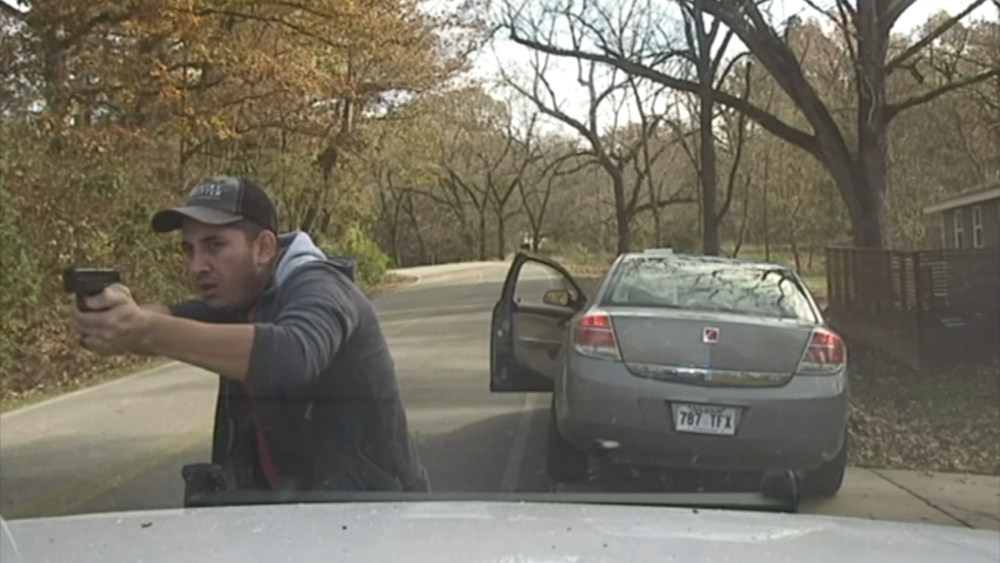 Dash cam video shows gun battle between police and man allegedly in the country illegally