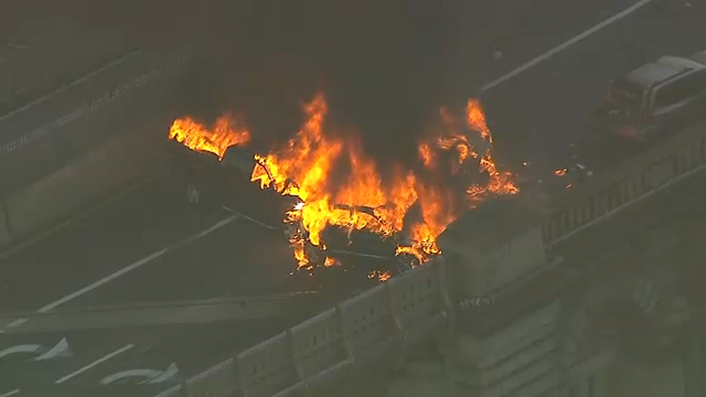 Two cars crashed and exploded in flames on the Brooklyn Bridge.