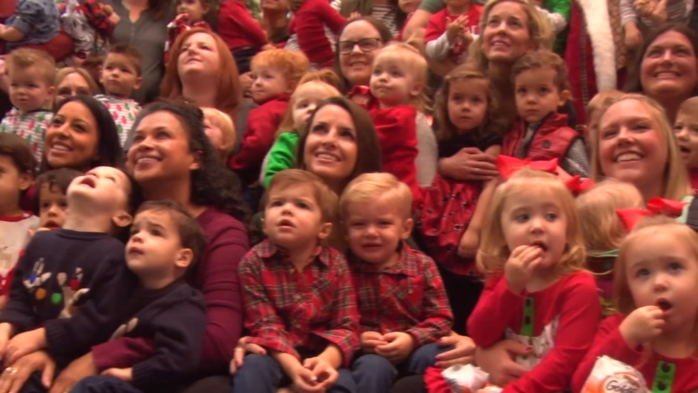 23 sets of twins pose with Santa