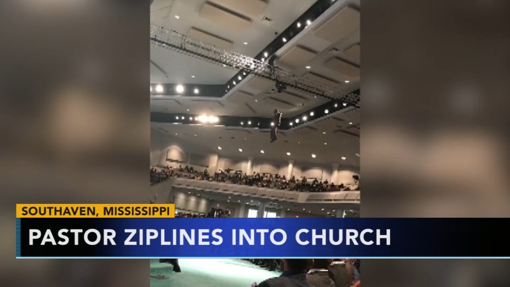 Pastor zip lines into church