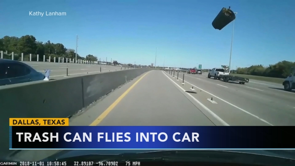 VIDEO: Trash can flies into car on Texas highway