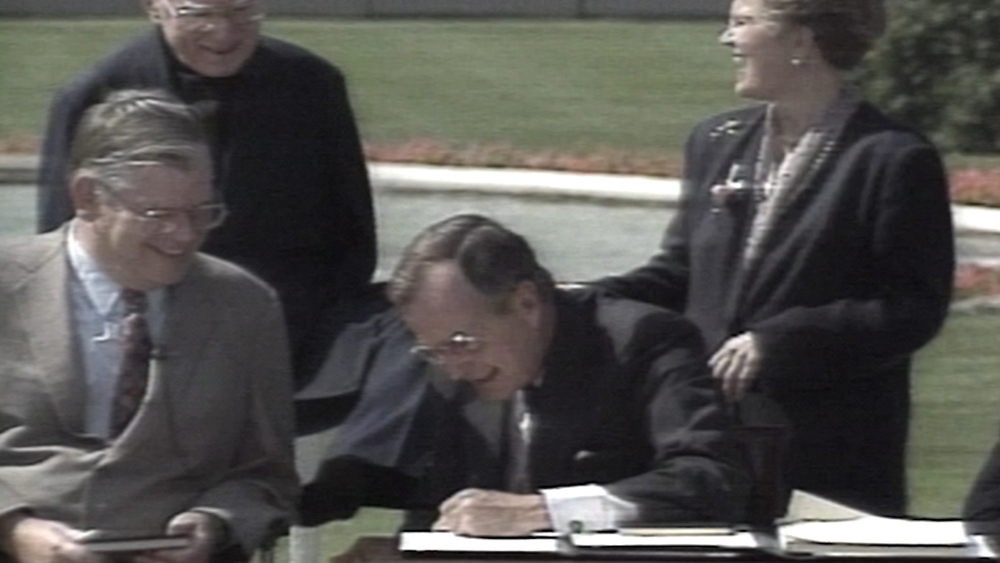 George HW Bush remembered for signing Americans with Disabilities Act into law