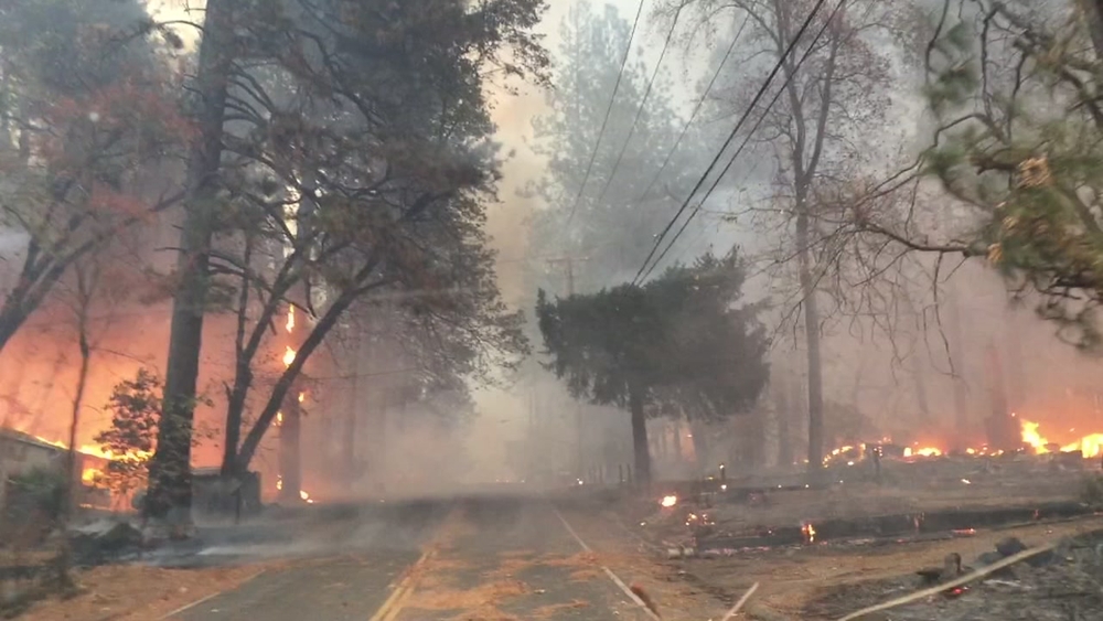 VIDEO: Former firefighter films as Paradise burns to ground