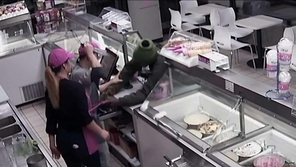 Bakin Robbins bravely dearms robber after he pulls a knife