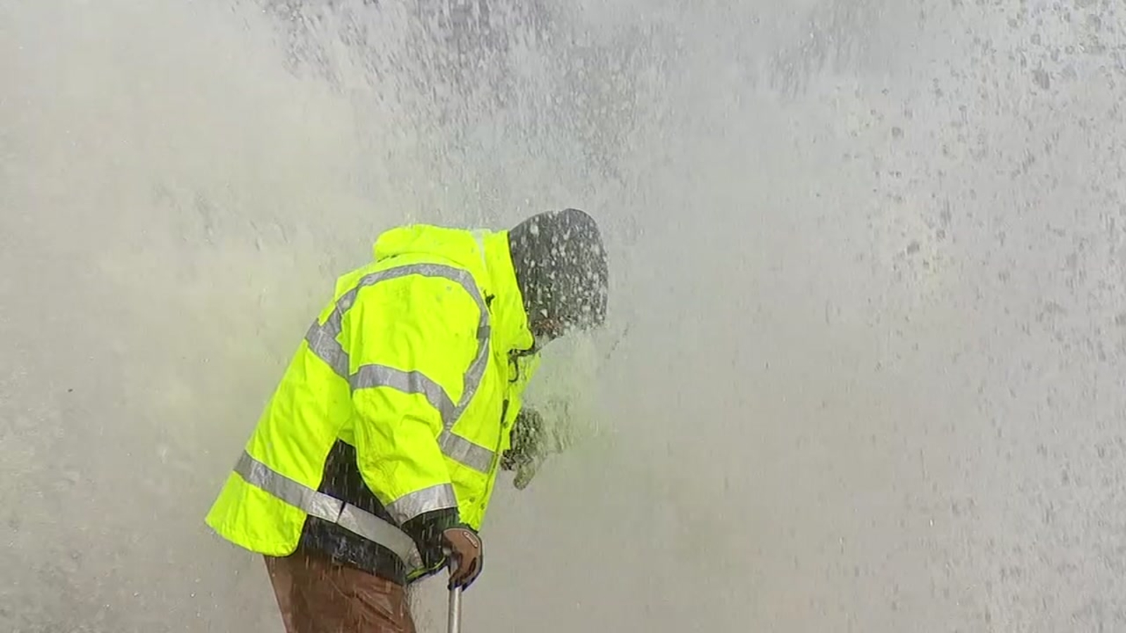 'That's my job' Raleigh worker endures super soaking to contain