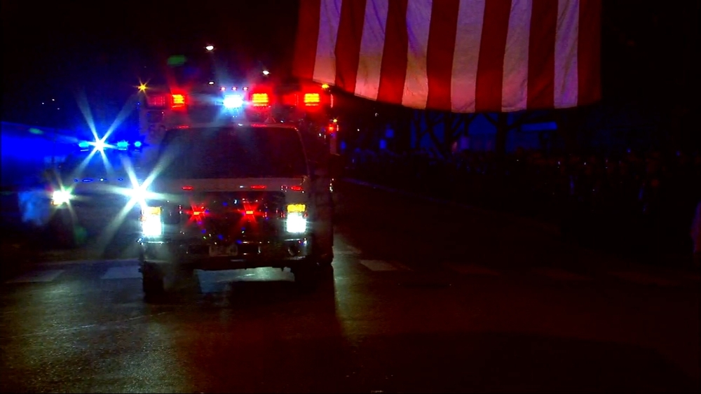 Bodies of fallen officers arrive at medical examiner's office