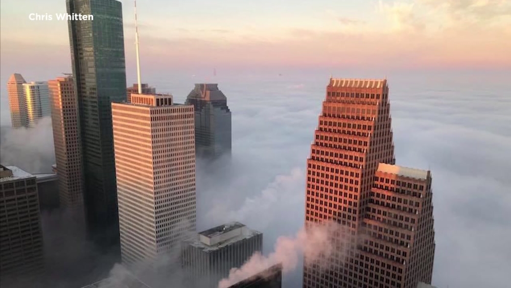 Dense fog creates beautiful photo opportunities downtown