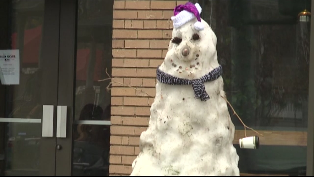 Snowman shows up outside Sacramento coffee house for Christmas