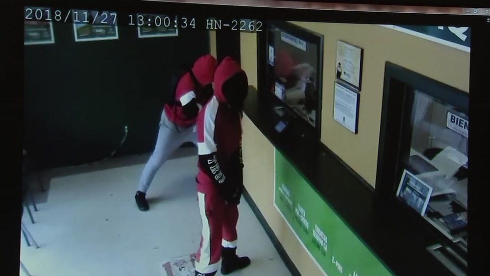 Police search for 2 suspects committing robberies in 'Santa' suits