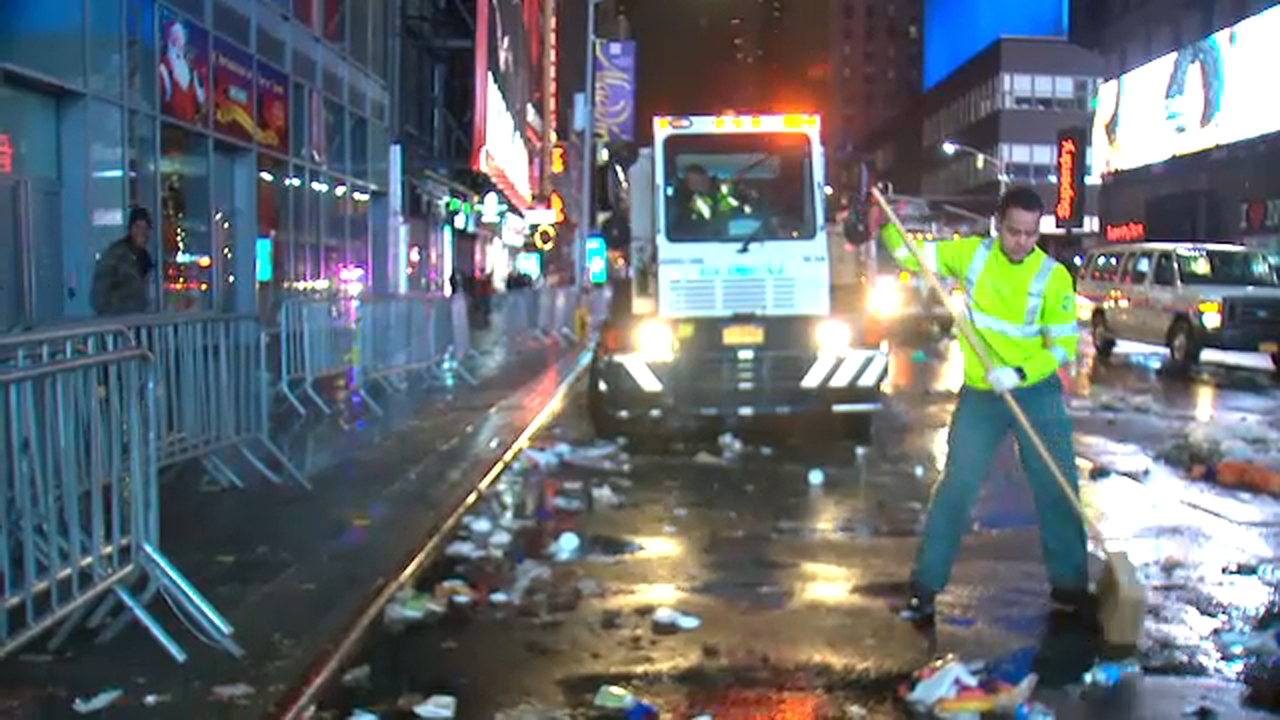 Sanitation workers clean up from New Year's Eve in Times Square