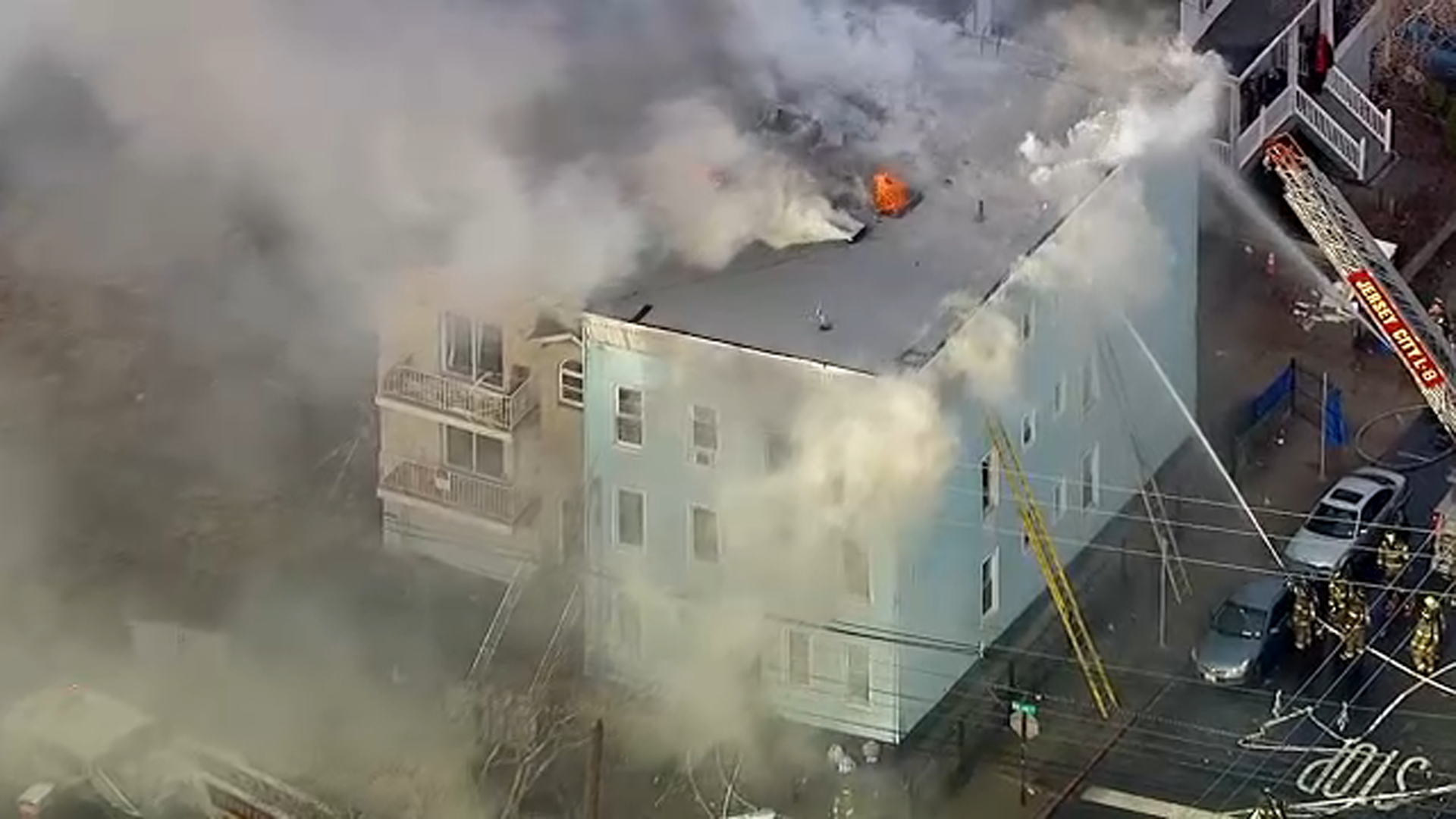 2 firefighters hospitalized after battling 3-alarm fire in multi-family home in New Jersey