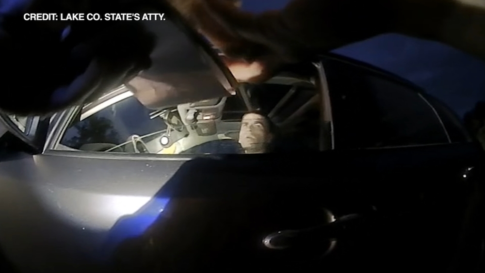 RAW VIDEO: Fugitive wanted for murder confronts Lakemoor officer