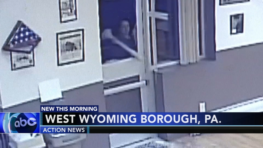 Woman breaks into police department looking for officer she was allegedly harassing