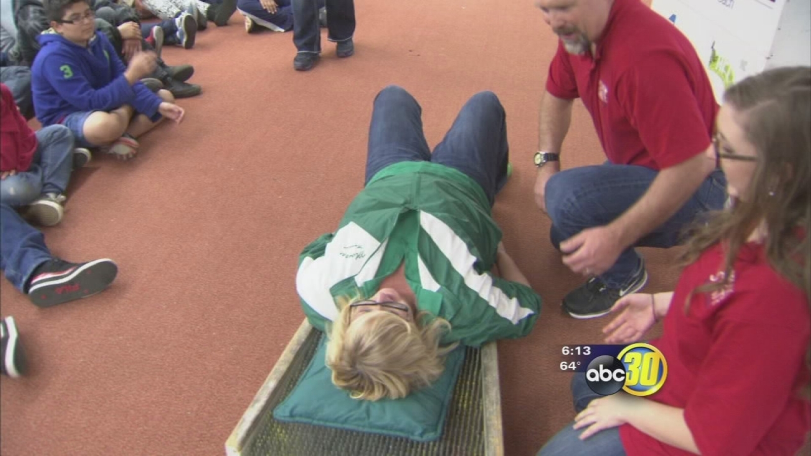 Fresno teacher lies on bed of nails for physics program ABC30 Fresno