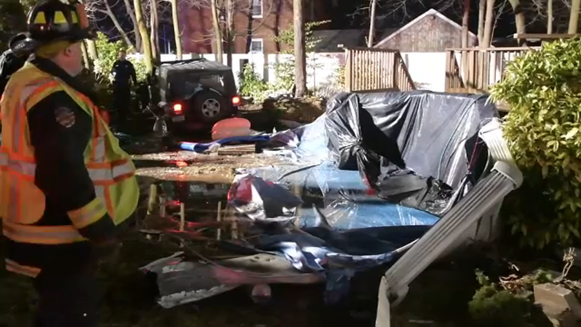 SUV crashes through backyard, into pool on Long Island