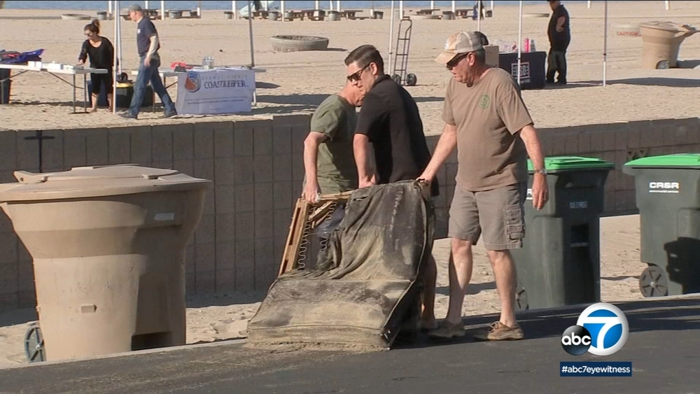 Volunteers team up for beach cleanup, donate to Coast Guard members