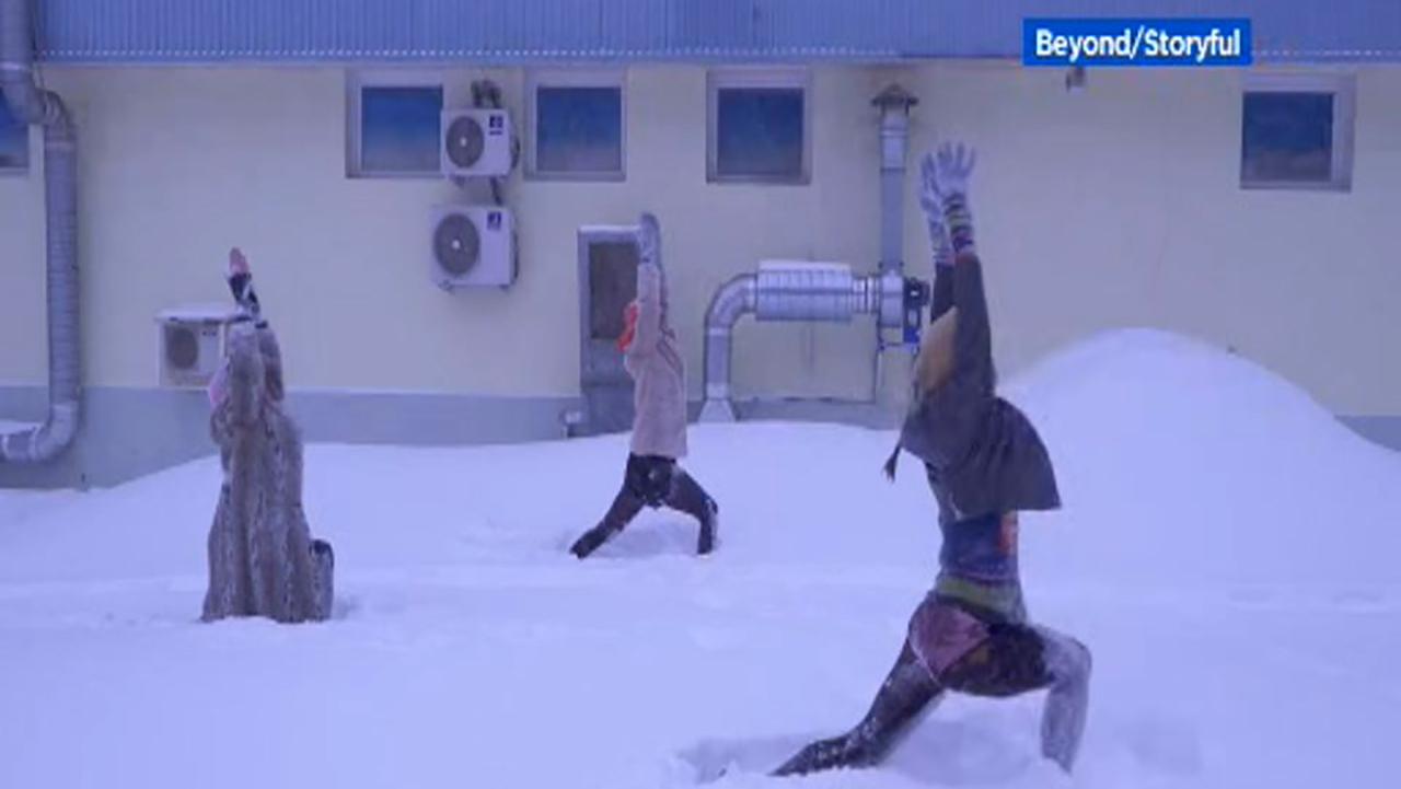 'Snowga', anyone? Women practice yoga in the snow