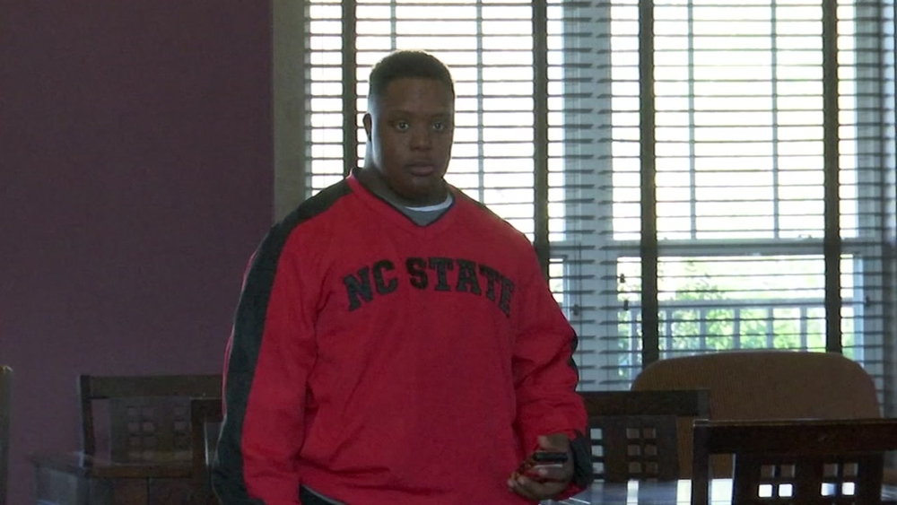 Triangle teen with Down syndrome knocks down 3-pointer at Wolfpack game 