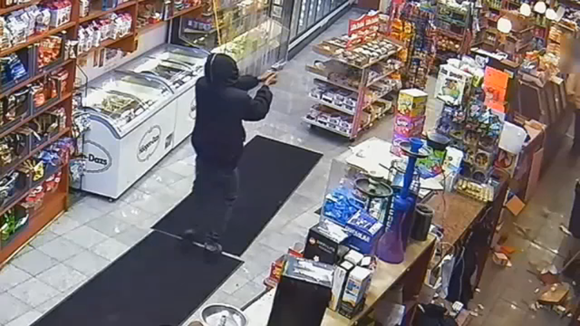 Queens deli worker grazed in head by bullet during robbery
