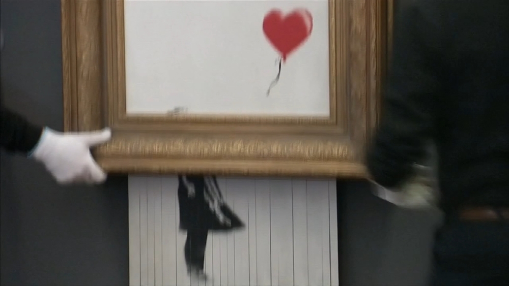 Shredded Banksy million dollar painting goes on display in Germany