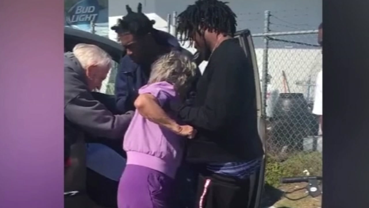 WATCH: Heartwarming video shows men helping elderly woman into van
