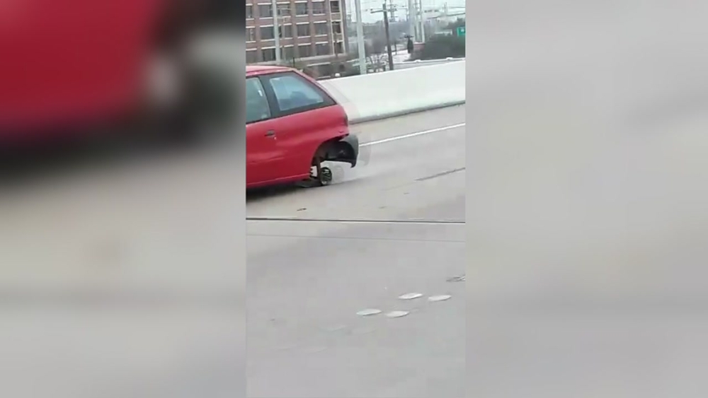 Car on rims bring sparks to Houston freeway
