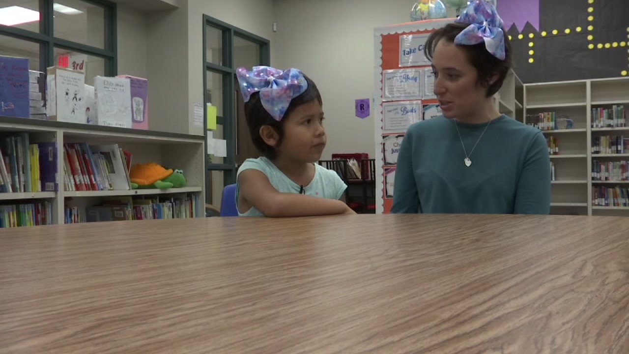 Teacher sports matching hairdo with bullied student