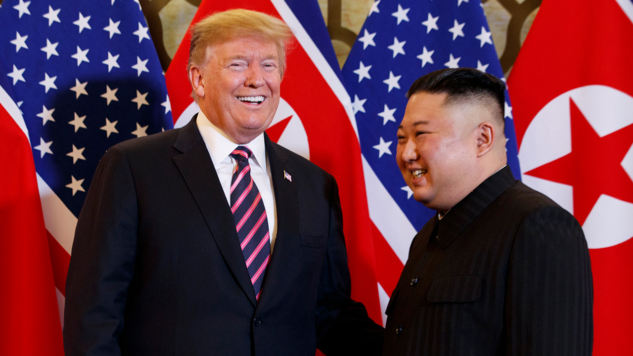 Trump, Kim open second nuclear summit with handshake, smiles