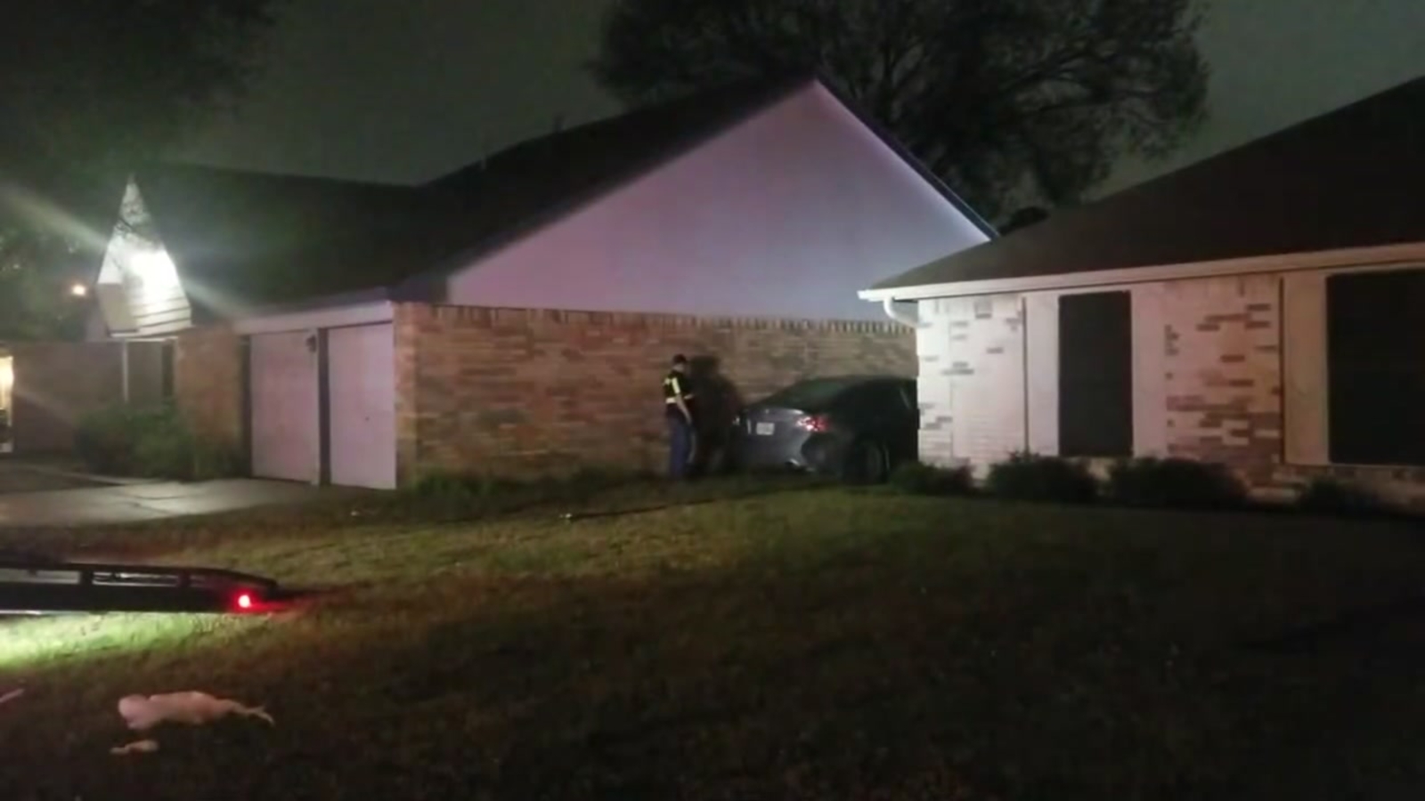 Stolen car crashes between two houses in northwest Harris County ...