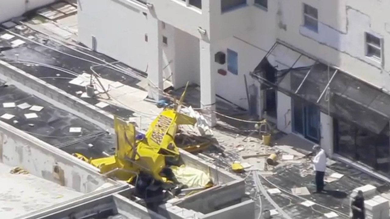 Pilot dead when small banner-plane crashes into apartment building in Fort Lauderdale