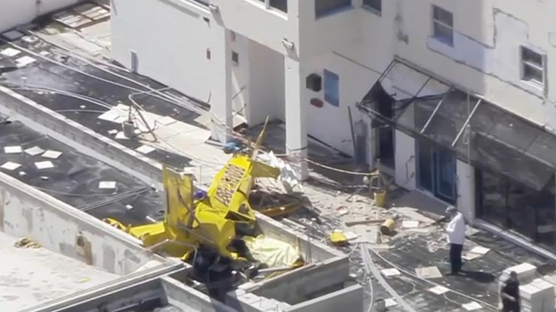 A Small Plane Towing A Banner Crashed Into An Apartment Building